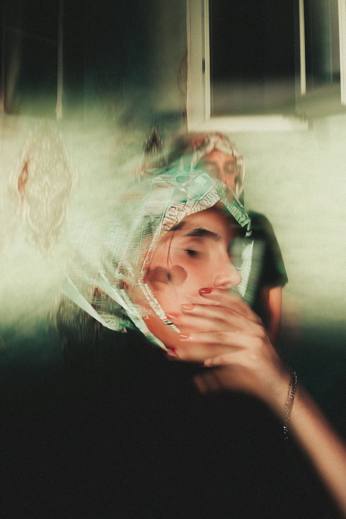 a person holding a fan