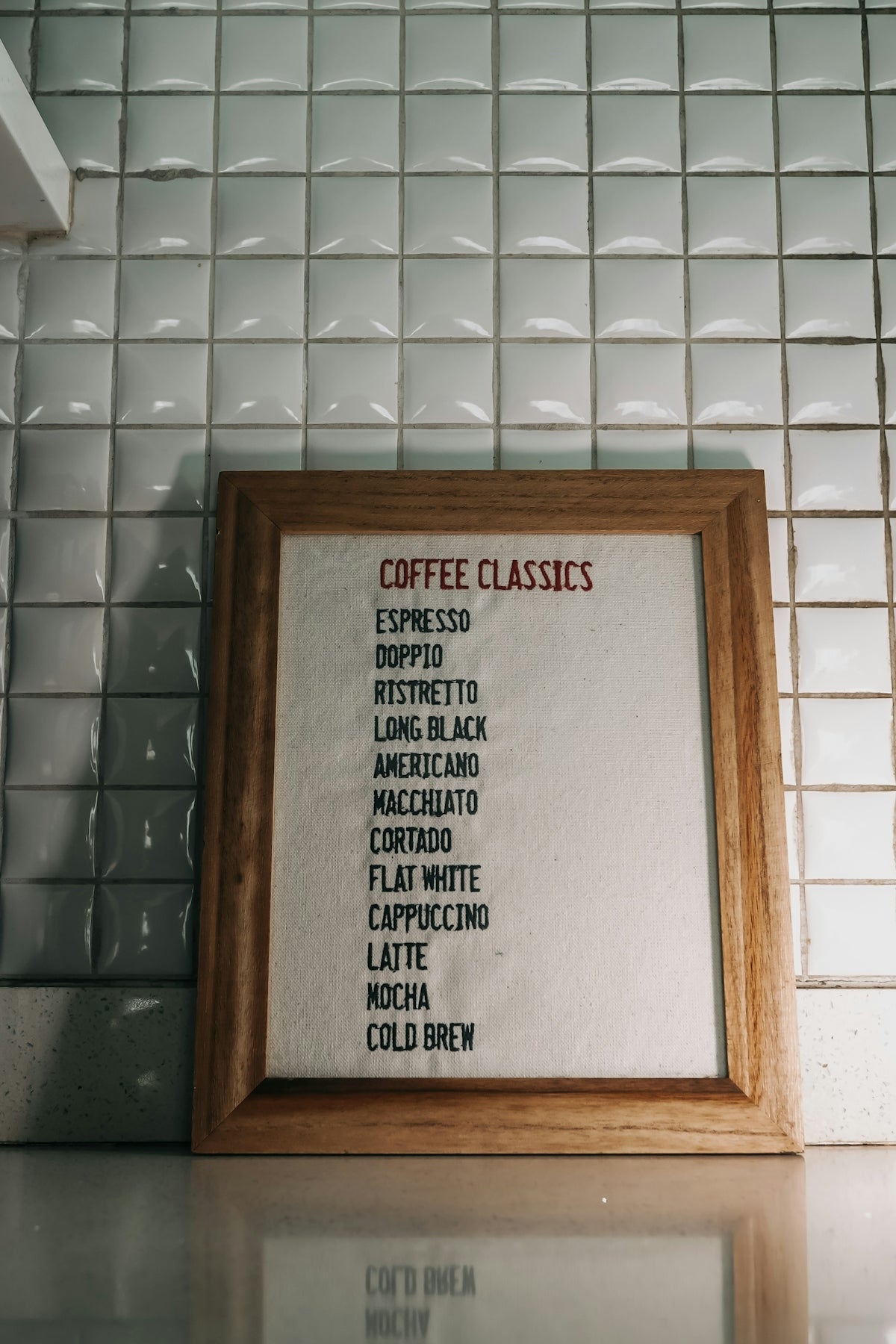 Coffee menu with various classic coffee drinks.